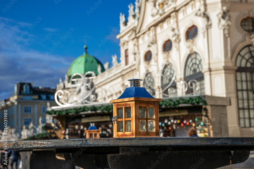 street candlestick on a table in front of the Belvedere Palace complex in Vienna, Austria.
