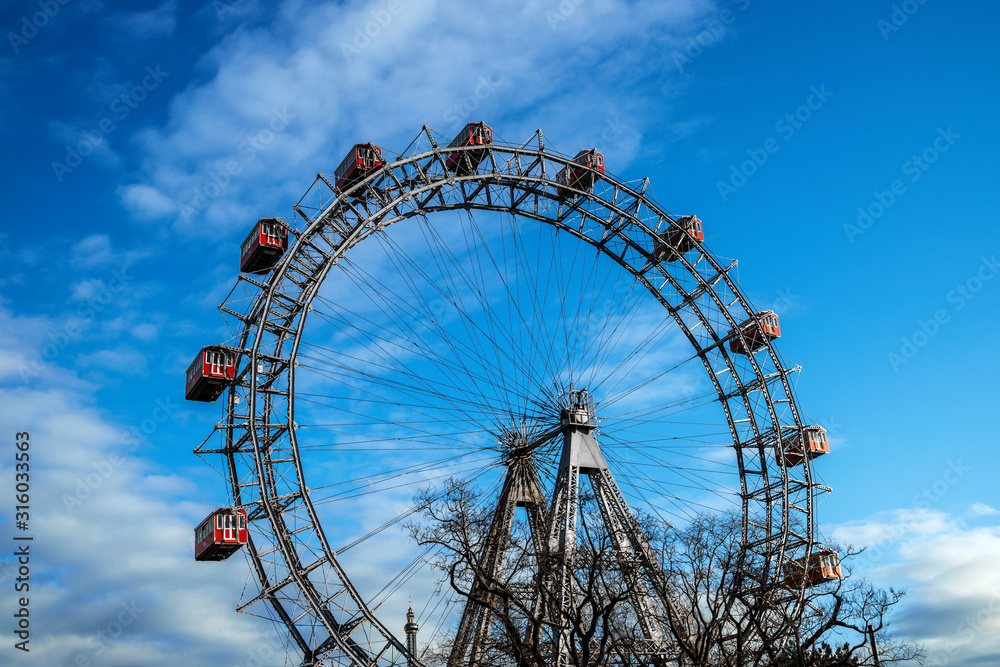 oldest ferris wheel at sunset in the Prater public park in Vienna, Austria.