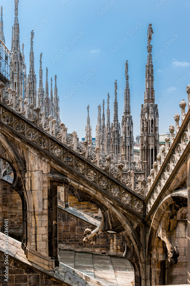 The Ornate roof top of the Duomo in Milan, Italy