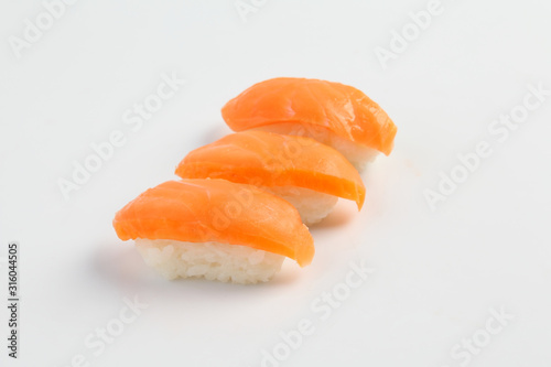 Salmon sushi on white background