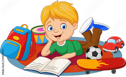 Happy little boy playing with toys