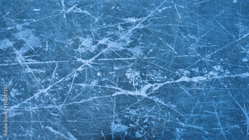 Texture of ice skating rink outdoors, winter background