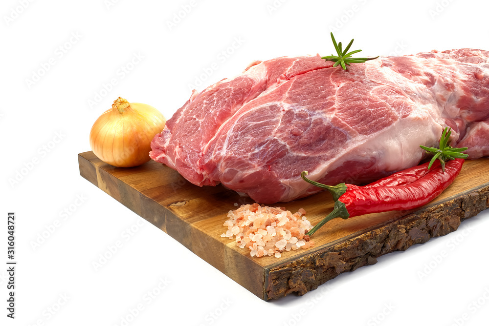 Fresh raw pork neck with spices on wooden board isolated on white. Fresh raw pork neck with spices on wooden board isolated on white.