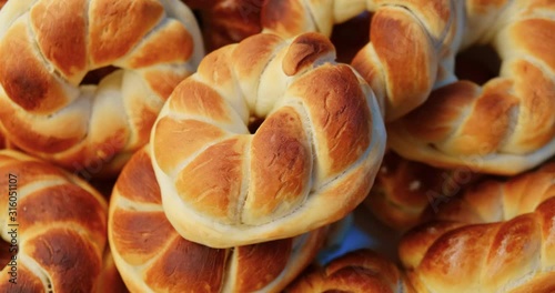 Rotating a pile of traditional Romanian pastry freshly baked - close up. photo