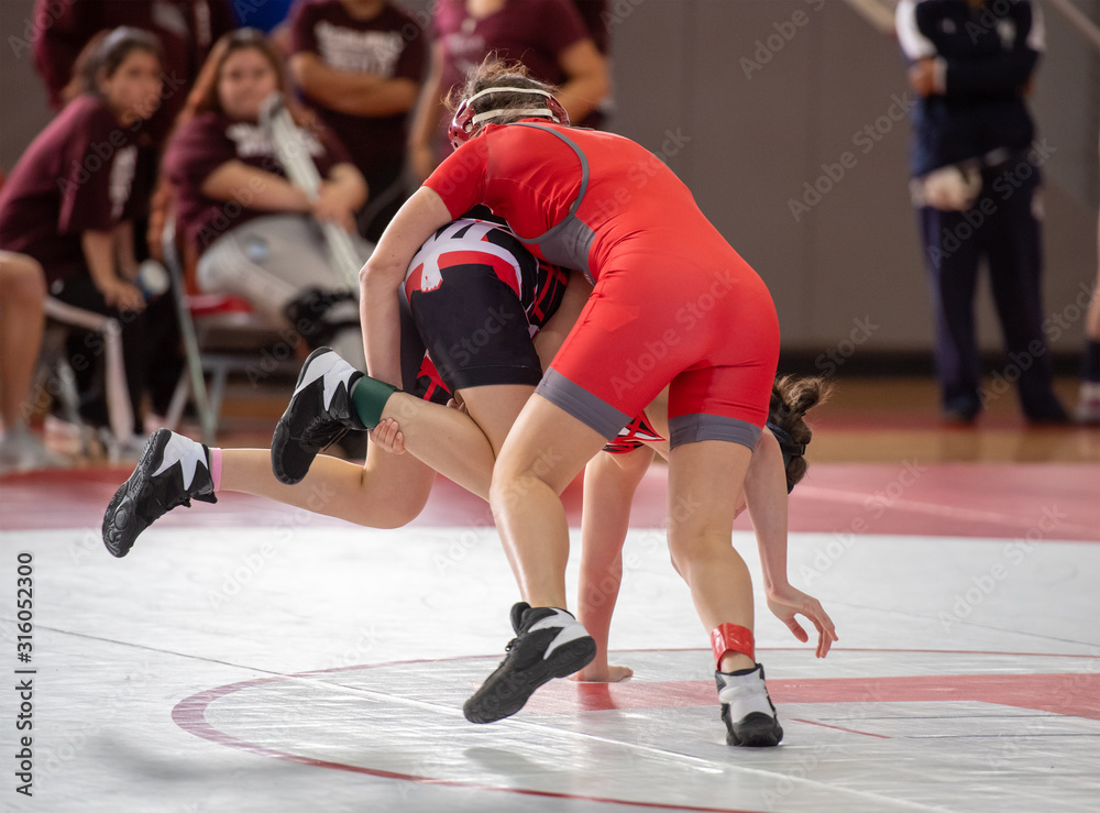 Fototapeta premium High School wrestlers competing at a wrestling meet