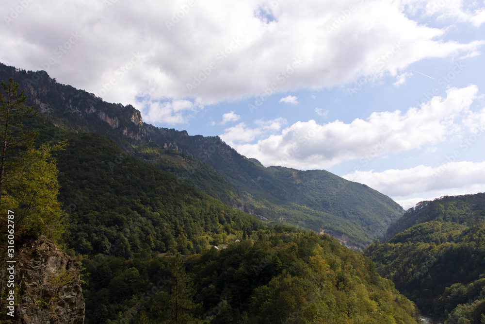 Mountains against the blue sky . Mountains in Montenegro. Selective focus. Mountains against the blue sky . Mountains in Montenegro. Selective focus.