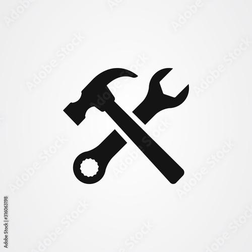 Hammer and wrench icon vector illustration