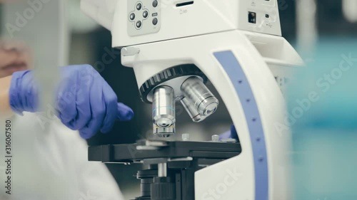 Scientists using microscope in bio lab and experiment, Scientists working in laboratory, Concept of science in laboratory