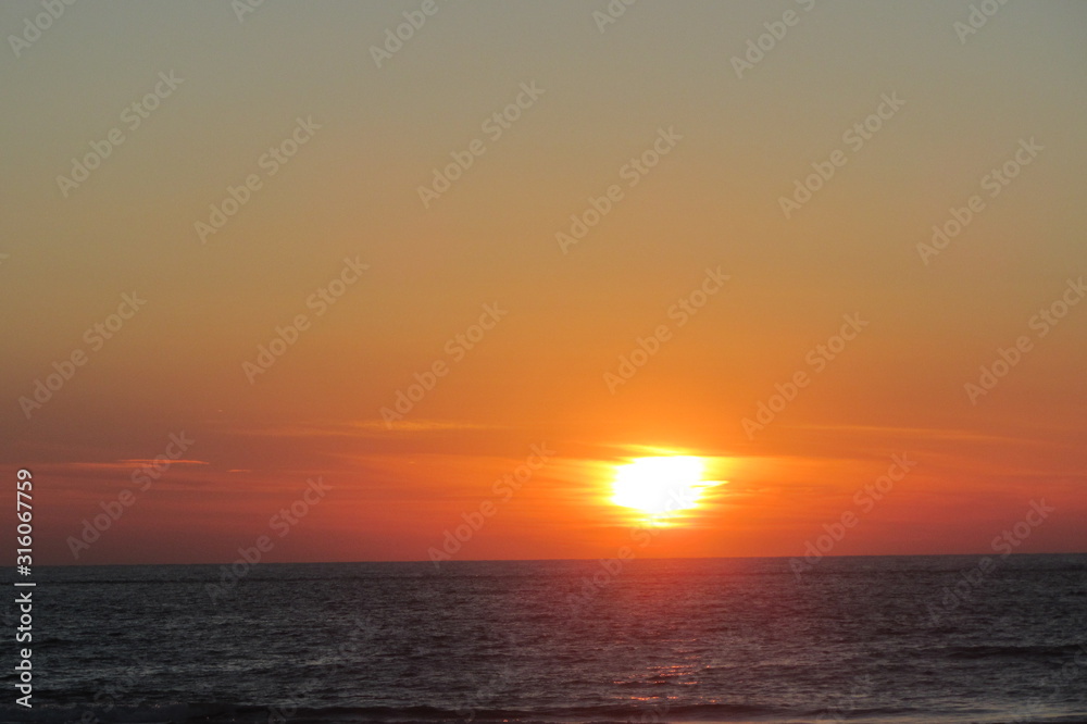 orange sunset over sea side