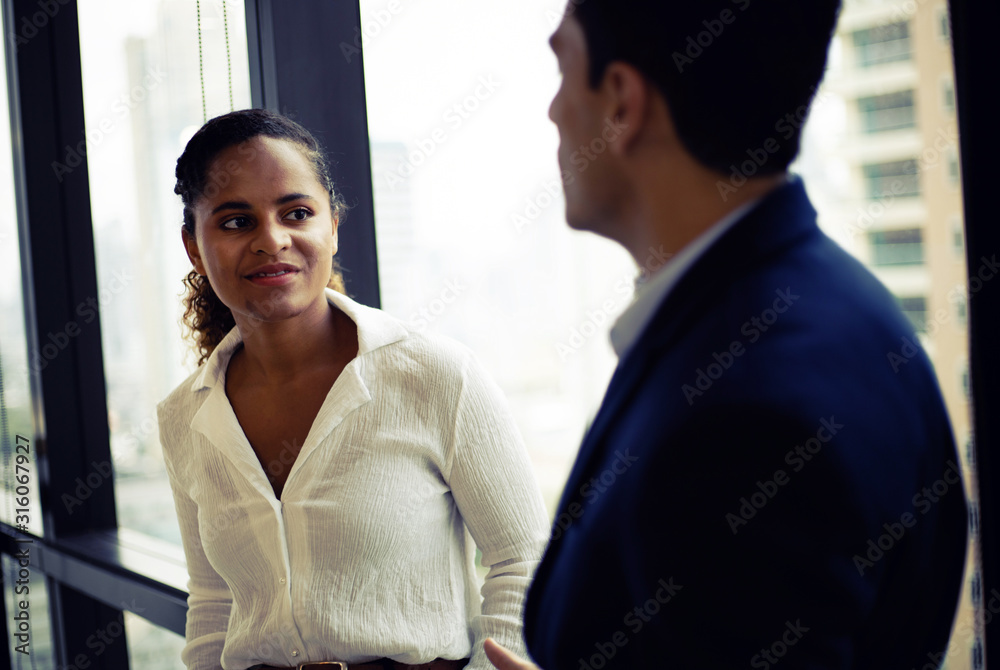Two business persons talking and meeting in break time at office. Two business persons talking and meeting in break time at office.