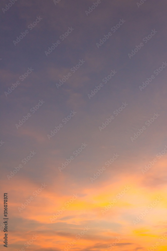 sunset sky with colorful sunlight in the evening on clouds vertical 