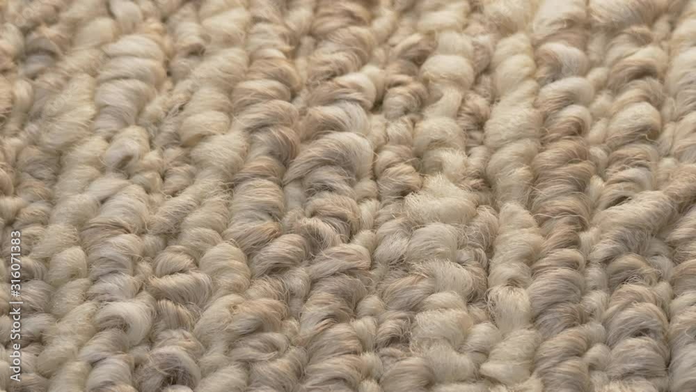 Macro closeup soft beige carpet rug texture
