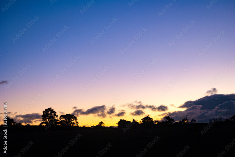 Dramatic sunset in rural area of ​​Guatemala, clear sky cold night of January 2020