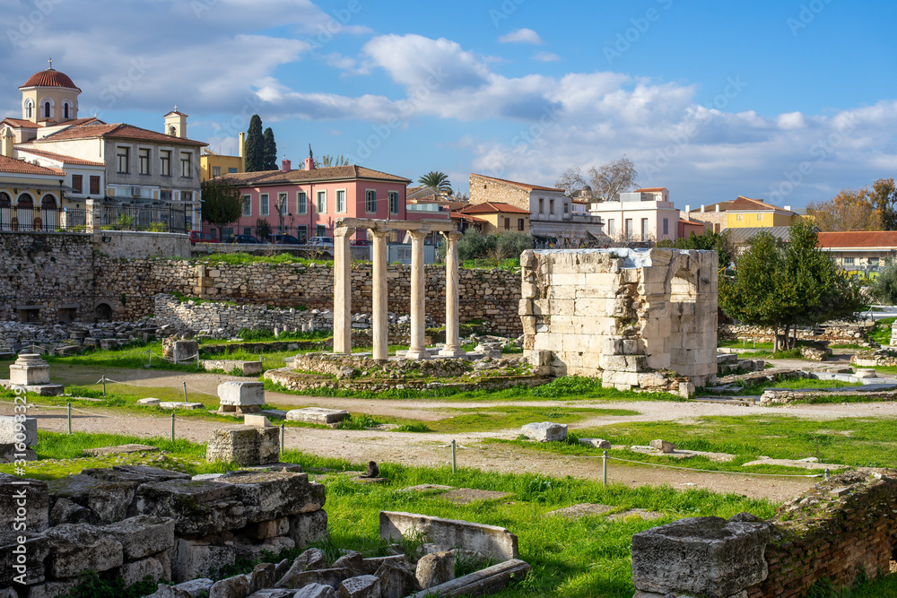 Roman Forum (Agora) in Monastiraki, Athens, Greece, ancient site and residential buildings.