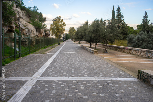 Wallpaper Mural Athens, Greece, Dionysiou Areopagitou street, early morning with no people.  Pedestrian walkway under acropolis hill. Torontodigital.ca