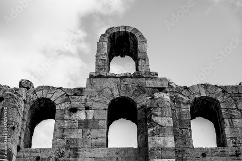 Wallpaper Mural Black and white photo of Odeon of Herodes Atticus facade detail in Athens, Greece. Also known as Herodeion is a stone Roman theater located on Acropolis hill slope. Torontodigital.ca