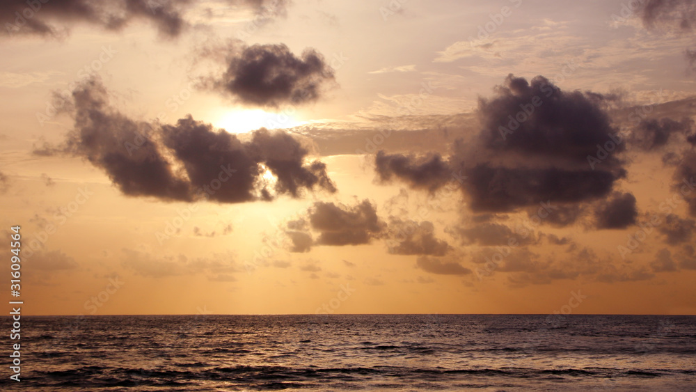 Sunset on a tropical beach, sunset sky, sunset sea, seascape, Thailand