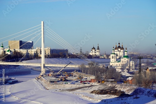view of the bridge in siberia in winter time photo