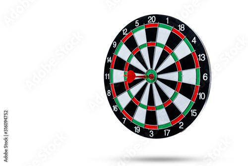 Red dart arrow hitting in the target center is Dart board Isolated on White background