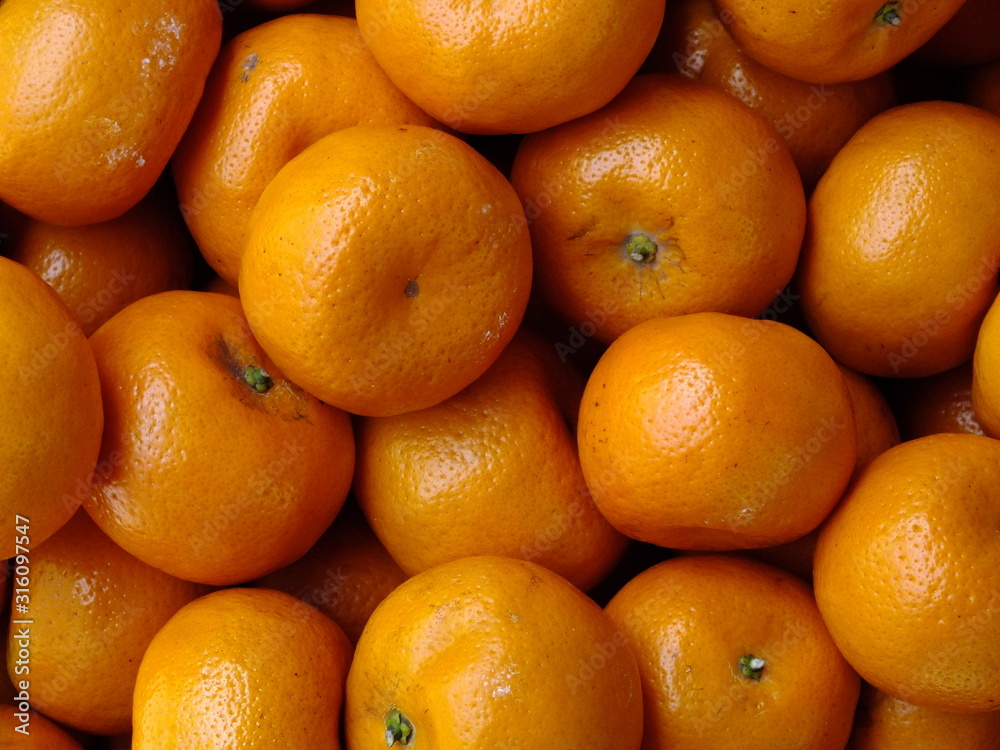 macro image of bright orange shiny juicy oranges macro image of bright orange shiny juicy oranges