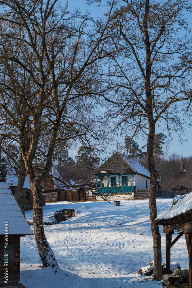 Traditional Romanian village houses. Romanian traditional architectural style, life in the countryside. Authentic Romanian lifestyle