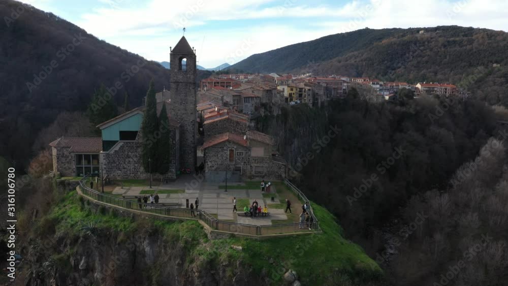 The ancient city on the cliff. Video shooting from the drone. Beautiful sunset with the sun. The ancient city on the cliff. Video shooting from the drone. Beautiful sunset with the sun.