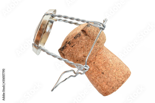 Champagne cork with wire isolated on white