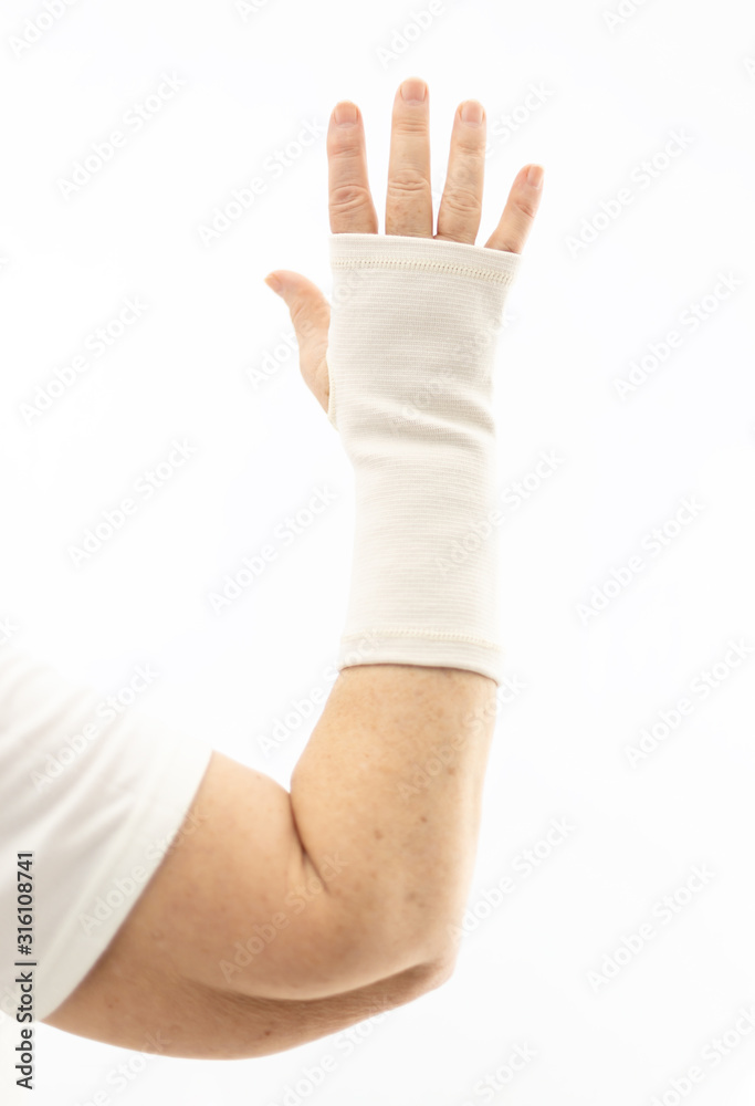 Person with a wrist support on his hand Person with a wrist support on his hand