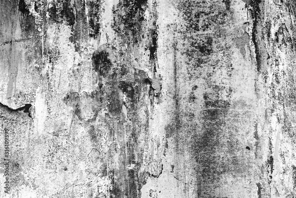 Fototapeta premium Texture of a concrete wall with cracks and scratches which can be used as a background