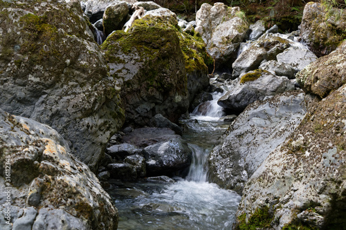 A river makes its course through rocks as it cascades down the river