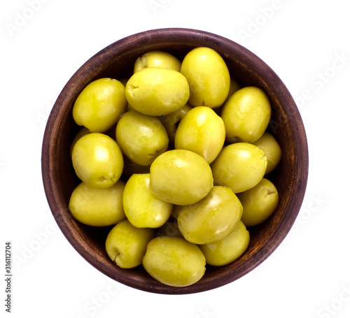  Green olives in bowl on white background