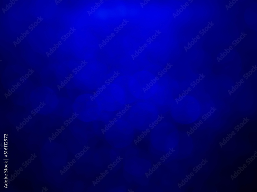Blue bokeh background.Blue bokeh light in black background. Blue bokeh background.Blue bokeh light in black background.