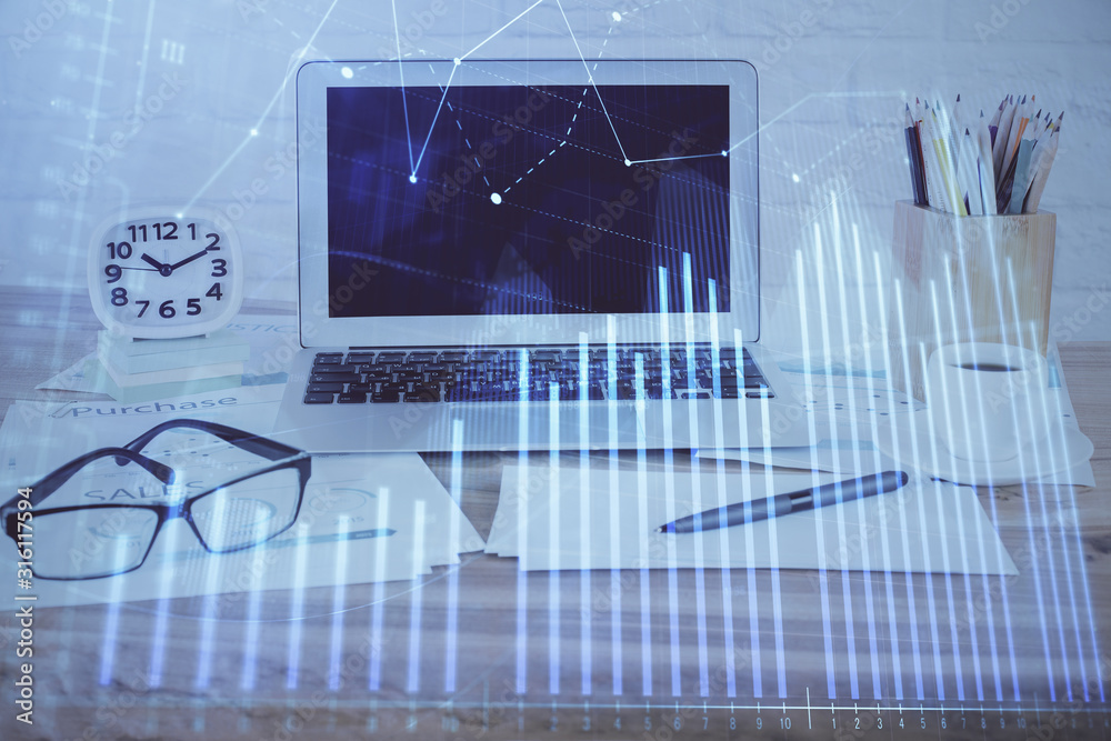 Stock market graph on background with desk and personal computer. Double exposure. Concept of financial analysis. Stock market graph on background with desk and personal computer. Double exposure. Concept of financial analysis.