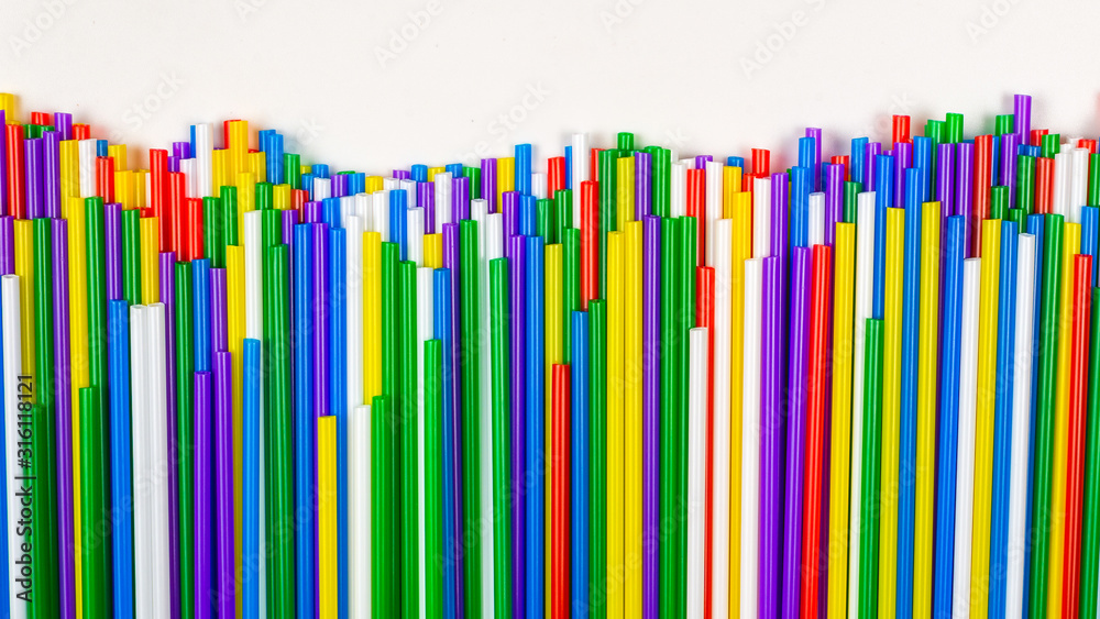 Colorful plastic tubules isolated on white. Colorful plastic tubules isolated on white.