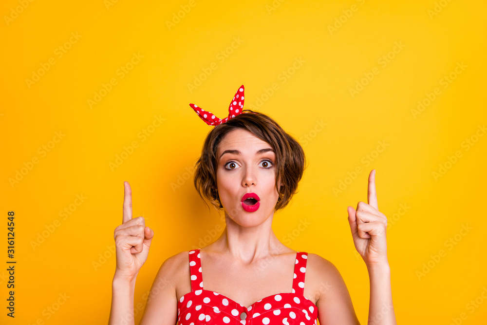 Portrait of astonished crazy girl point index finger up copyspace indicate look incredible ads promo impressed scream wow omg wear stylish clothing isolated over bright color background Portrait of astonished crazy girl point index finger up copyspace indicate look incredible ads promo impressed scream wow omg wear stylish clothing isolated over bright color background