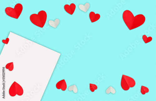 The Valentine's Day background. Valentines day concept.Red hearts on pastel blue background.copy space Valentines day