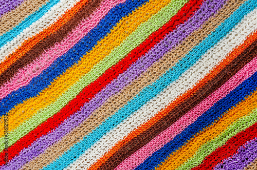 Knitting project over wooden background