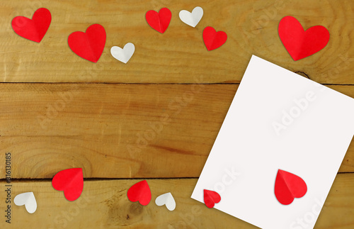 The Valentine's Day background. Valentines day concept.Red hearts on wood background.copy space Valentines day