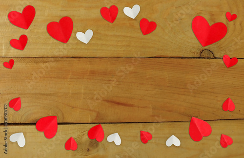 Valentine's Day background. Valentines day concept.Red hearts on wood background.copy space Valentines day