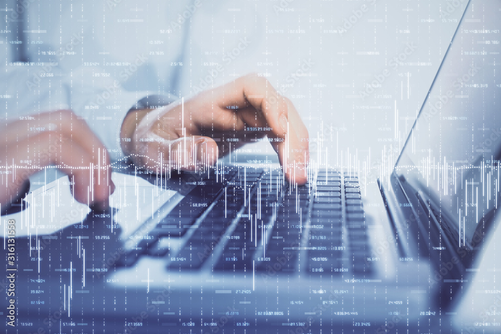 Double exposure of market chart with man working on computer on background. Concept of financial analysis. Double exposure of market chart with man working on computer on background. Concept of financial analysis.