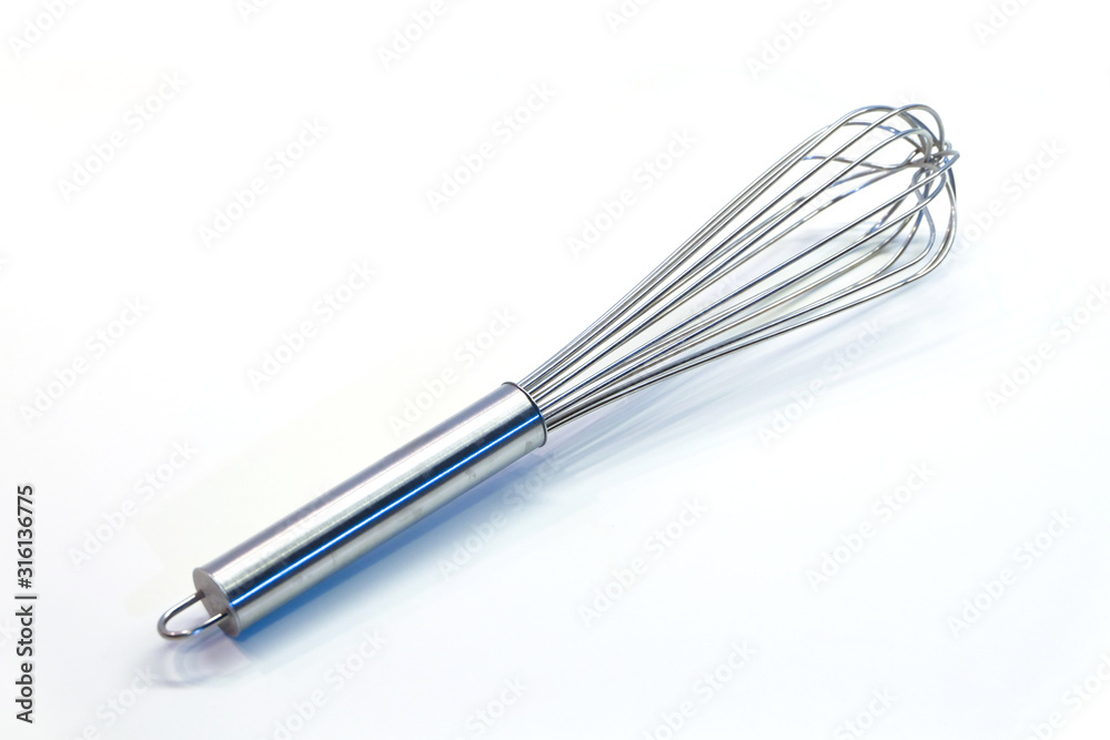 silver egg whisk on a white background silver egg whisk on a white background