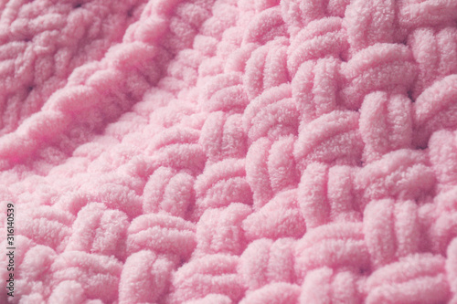 Pink puffy fine wool blanket, closeup