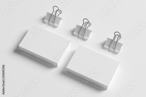 Blank business cards and binders isolated on white. Mockup concept for graphic designers presentations and portfolios. 3d render.