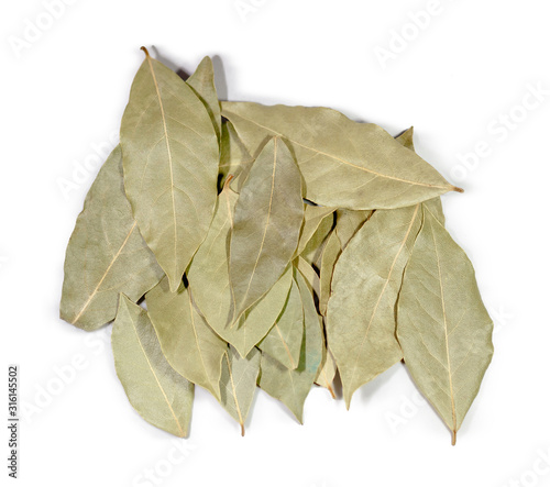 heap of leaves of bay leaf isolated on a white background top view