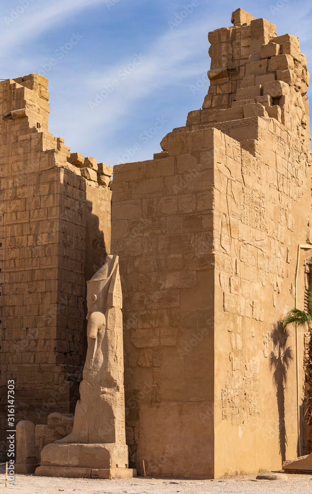Egypt, Luxor - Karnak Temple, complex of Amun-Re. Statues of Ramses II and Nefertiti.