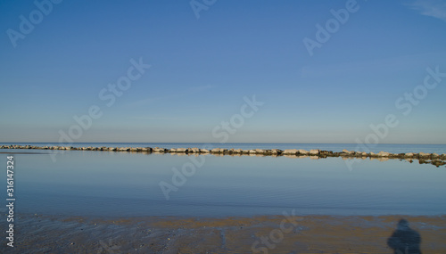 Ombra sulla bassa marea © Luciano Pierantoni