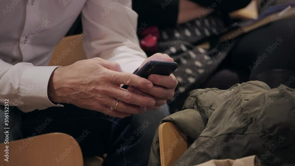 Crop person browsing smartphone Crop person browsing smartphone