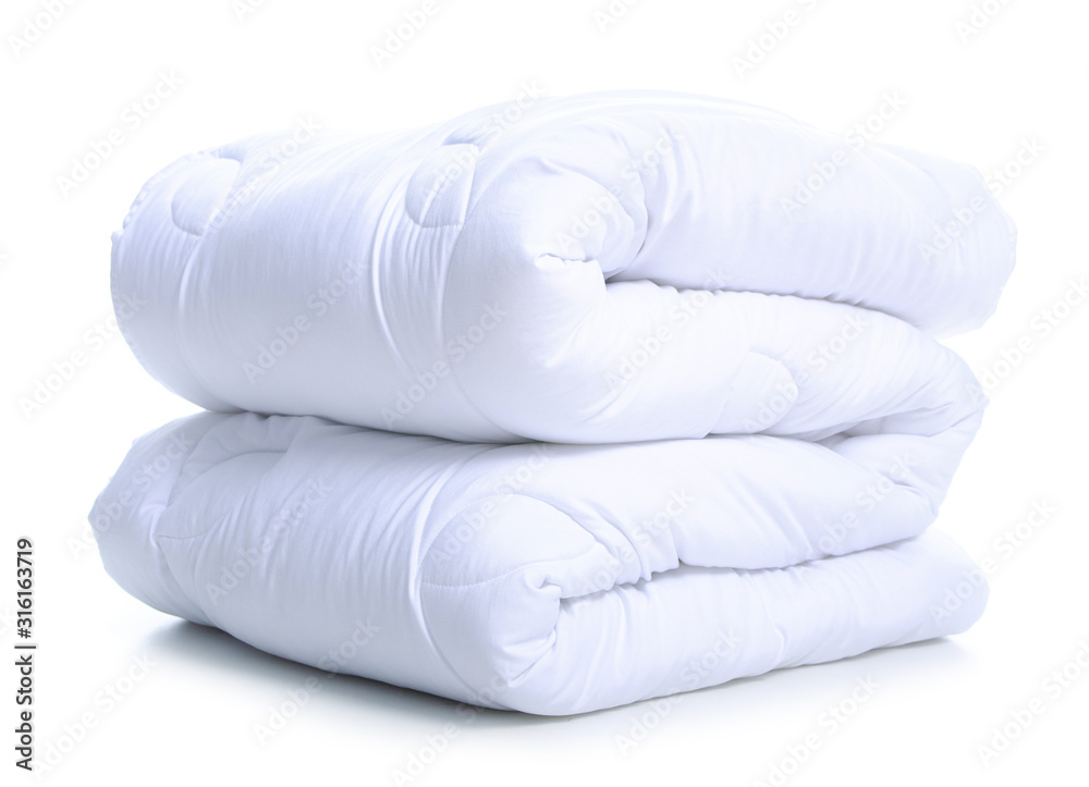 Fotografie Folded white soft warm blanket on white background isolation