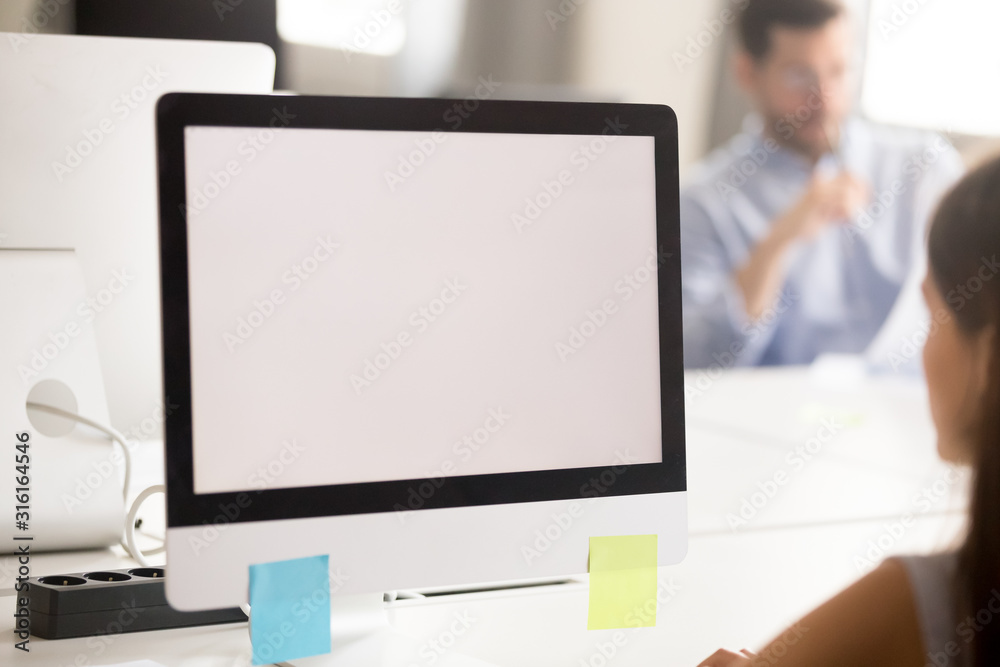 Close up of female working in office looking at screen Close up of female working in office looking at screen