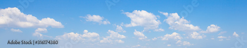 Fluffy Clouds In Blue Sky. Background From Clouds.